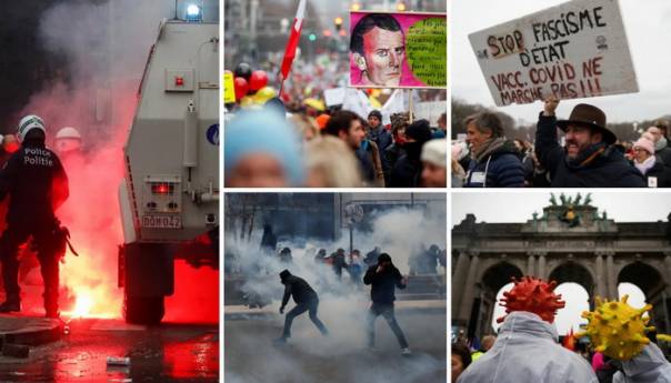 U Briselu protesti zbog korona mjera: Bacaju baklje, policija suzavce